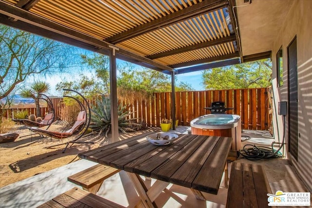 wooden deck with a patio area