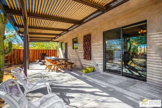 view of patio featuring a pergola