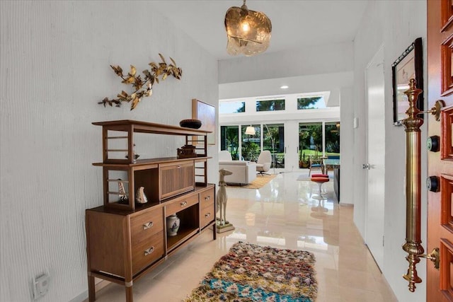 foyer entrance featuring a high ceiling