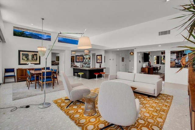 living room featuring an inviting chandelier