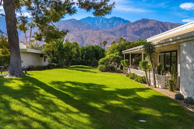 view of yard with a mountain view