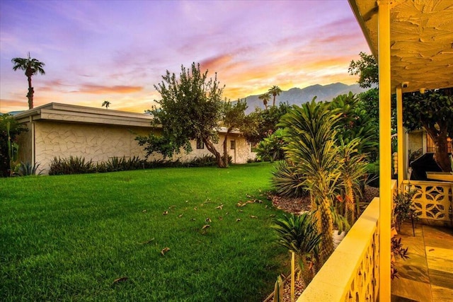 yard at dusk with a mountain view