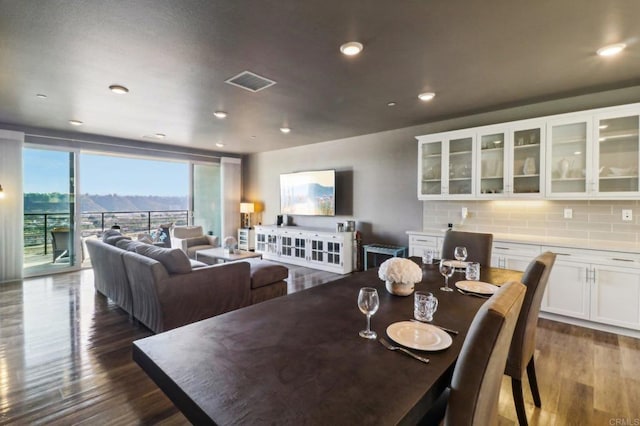 dining room featuring dark hardwood / wood-style flooring