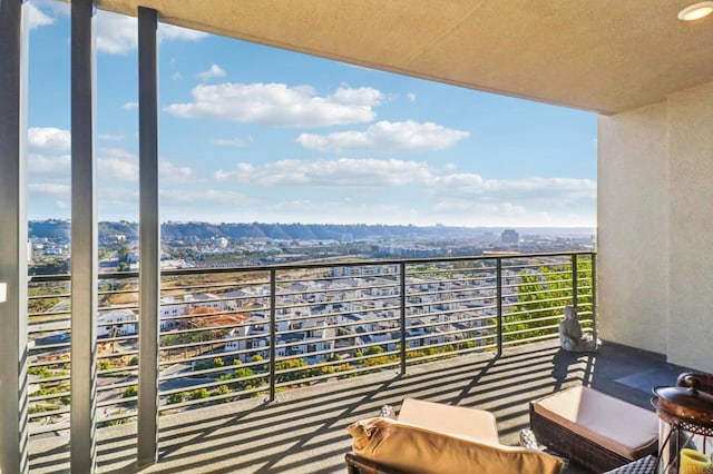 balcony featuring a mountain view