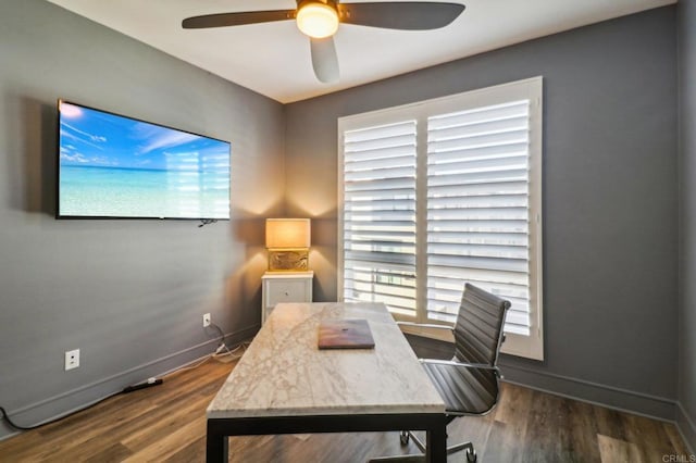 office featuring dark wood-type flooring and ceiling fan