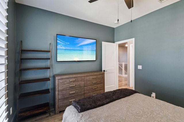 bedroom with ceiling fan and wood finished floors