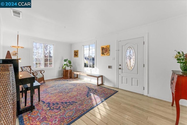 foyer featuring light wood-type flooring