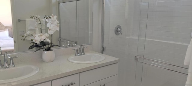 bathroom with vanity and walk in shower