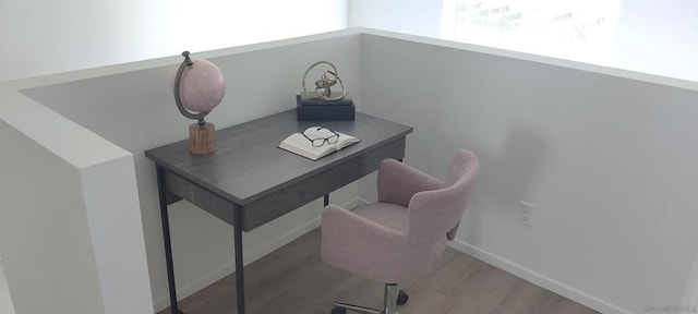 home office featuring hardwood / wood-style floors