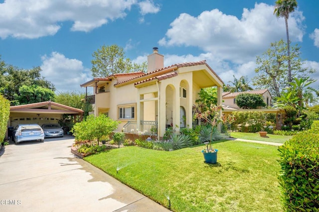 mediterranean / spanish home with covered porch, a front lawn, and a carport