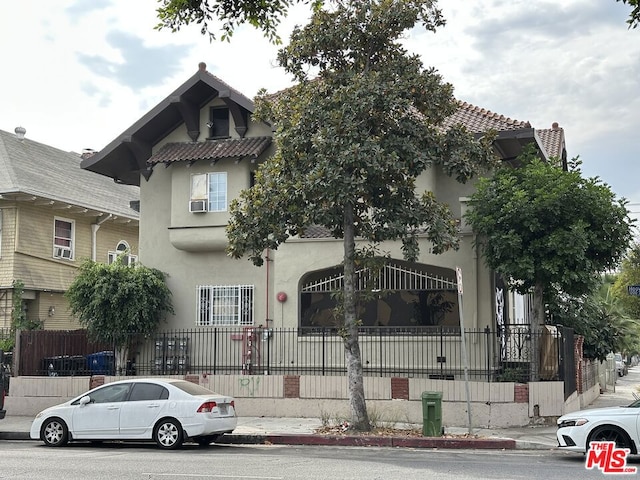 view of front of property featuring cooling unit