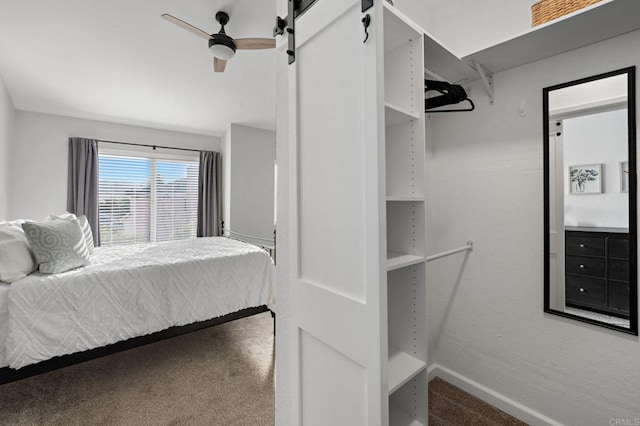 bedroom with ceiling fan and carpet floors