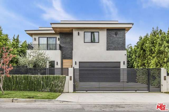 modern home featuring a garage