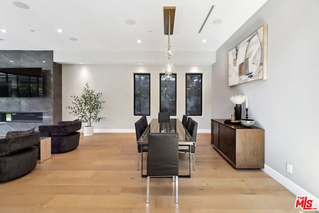 dining area with light wood-type flooring