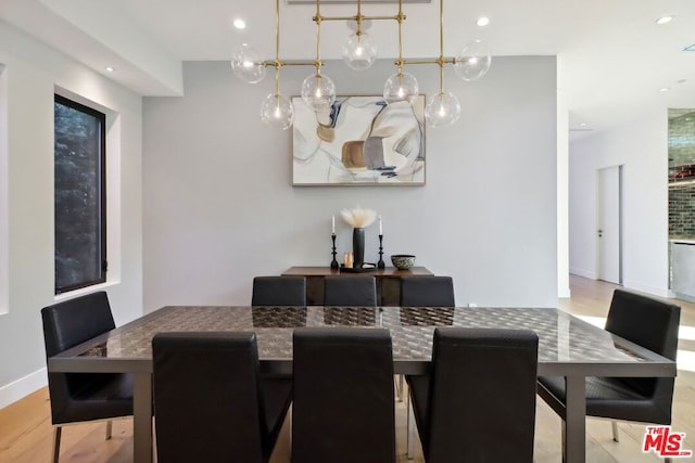 dining space featuring light hardwood / wood-style flooring