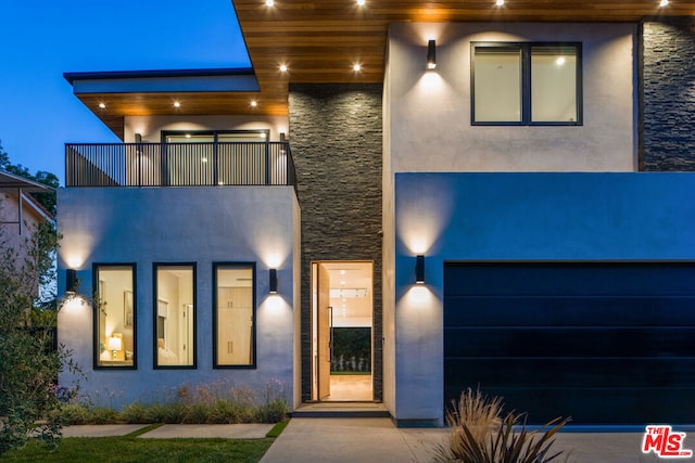 contemporary home featuring a balcony