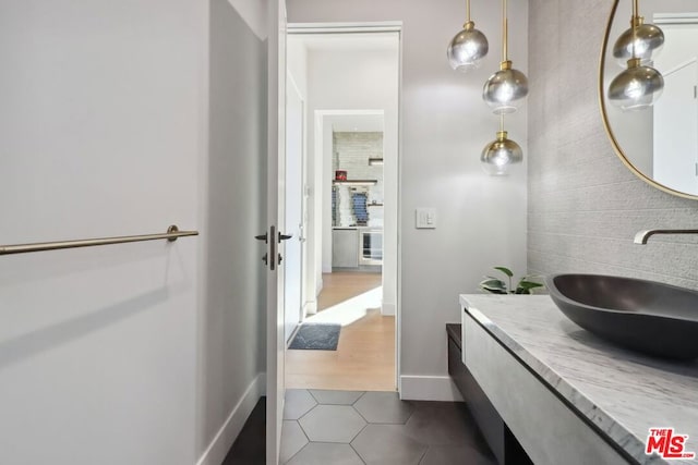 bathroom with vanity and tile patterned floors