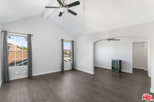 unfurnished living room featuring beamed ceiling, dark hardwood / wood-style floors, ceiling fan, and high vaulted ceiling