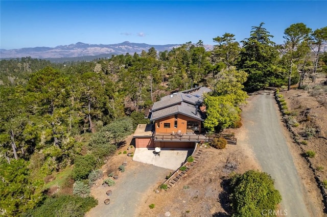 birds eye view of property featuring a mountain view