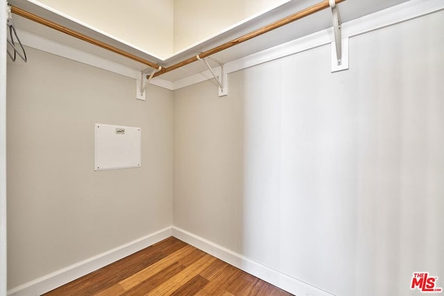 walk in closet featuring hardwood / wood-style floors