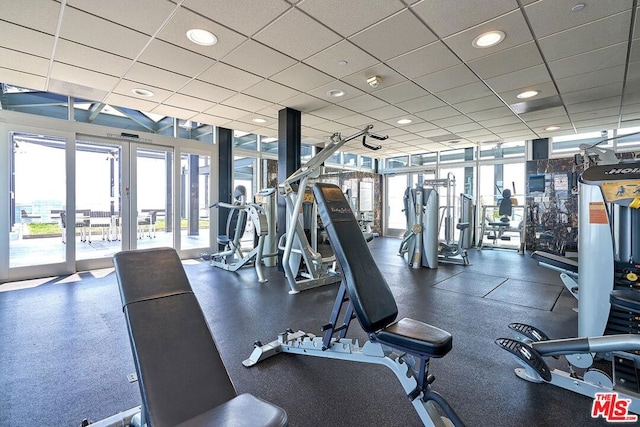 workout area with a drop ceiling