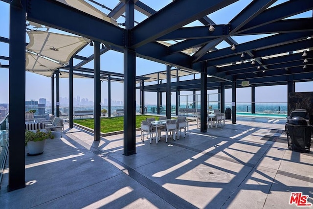 view of patio with a community pool