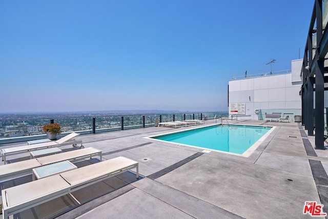 view of pool with a patio