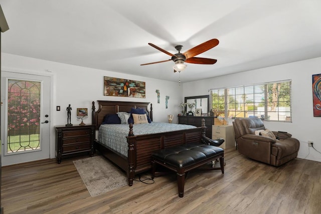 bedroom featuring ceiling fan and hardwood / wood-style floors