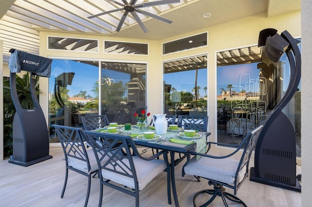 view of patio / terrace featuring ceiling fan