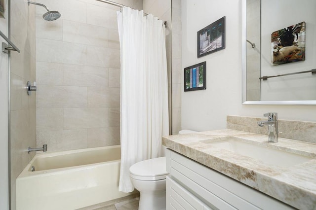 full bathroom featuring vanity, toilet, and shower / tub combo