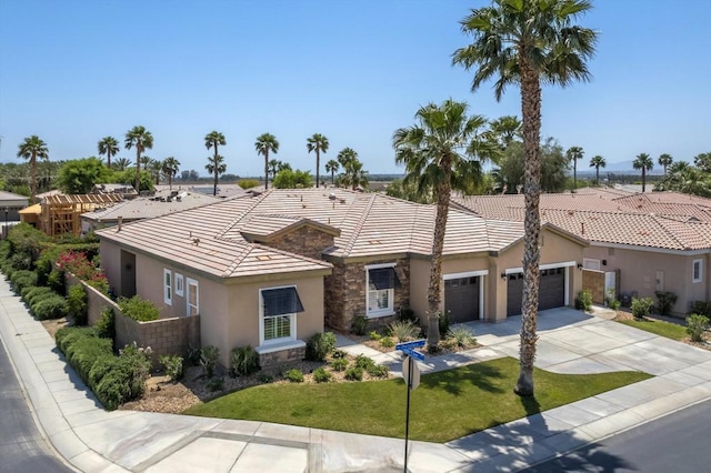 ranch-style house with a front lawn and a garage