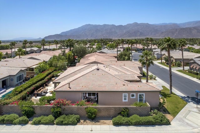 drone / aerial view featuring a mountain view