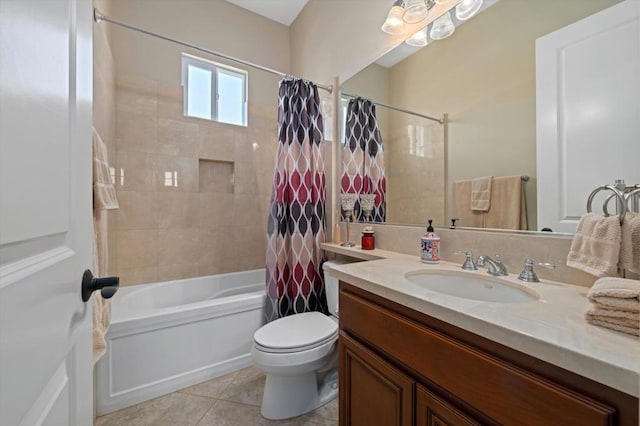 full bathroom with tile patterned floors, vanity, shower / tub combo, and toilet