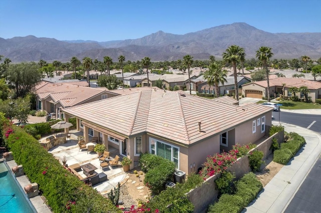 bird's eye view with a mountain view