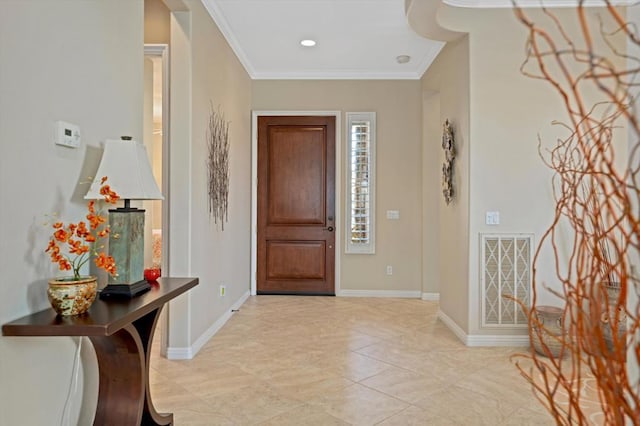 entrance foyer featuring crown molding