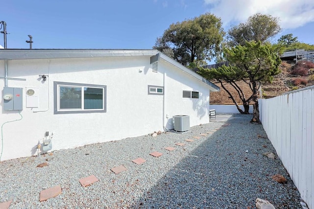 view of home's exterior featuring central AC unit