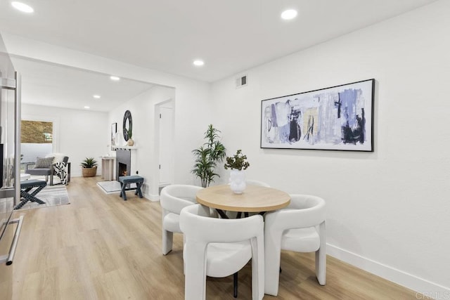 dining room featuring light wood-type flooring