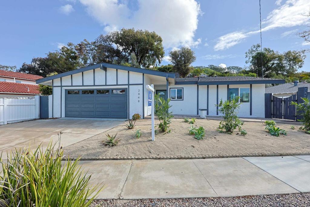 ranch-style house with a garage