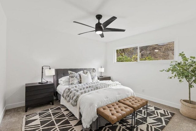 bedroom with ceiling fan and carpet flooring