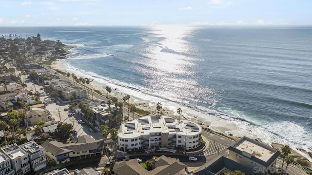 aerial view featuring a water view and a view of the beach