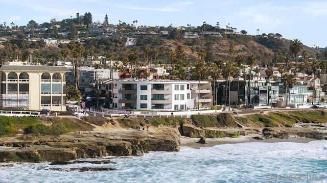 view of property with a water view