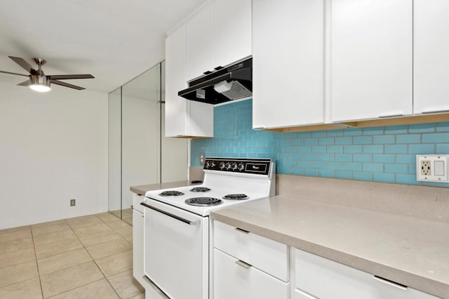 kitchen with white cabinets, electric range, decorative backsplash, ceiling fan, and light tile patterned flooring