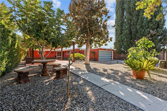 view of yard with a garage