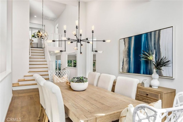 dining room featuring a chandelier and hardwood / wood-style floors