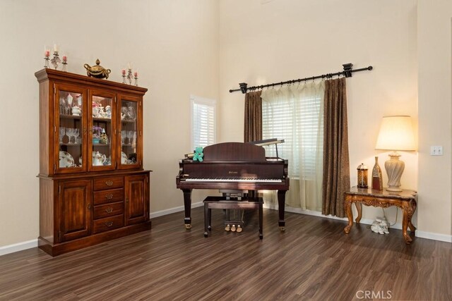 miscellaneous room with dark hardwood / wood-style floors