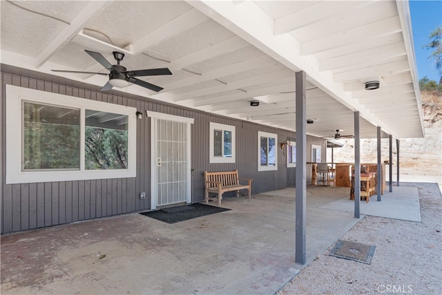 view of patio / terrace featuring ceiling fan