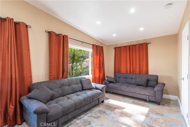 living room with lofted ceiling