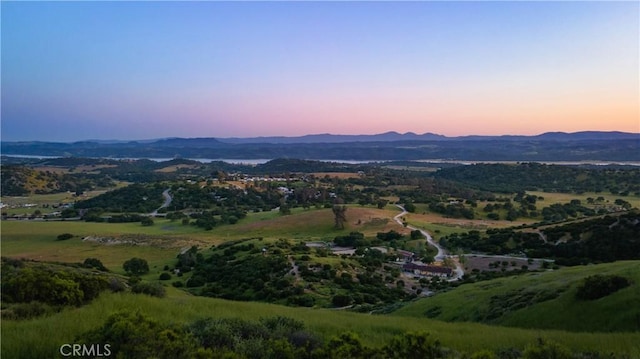 aerial view at dusk with a mountain view