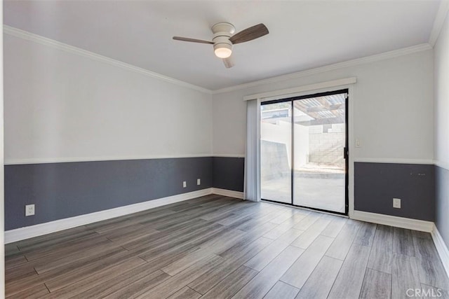 spare room with hardwood / wood-style flooring, ceiling fan, and ornamental molding