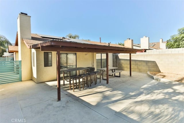 back of house featuring a patio